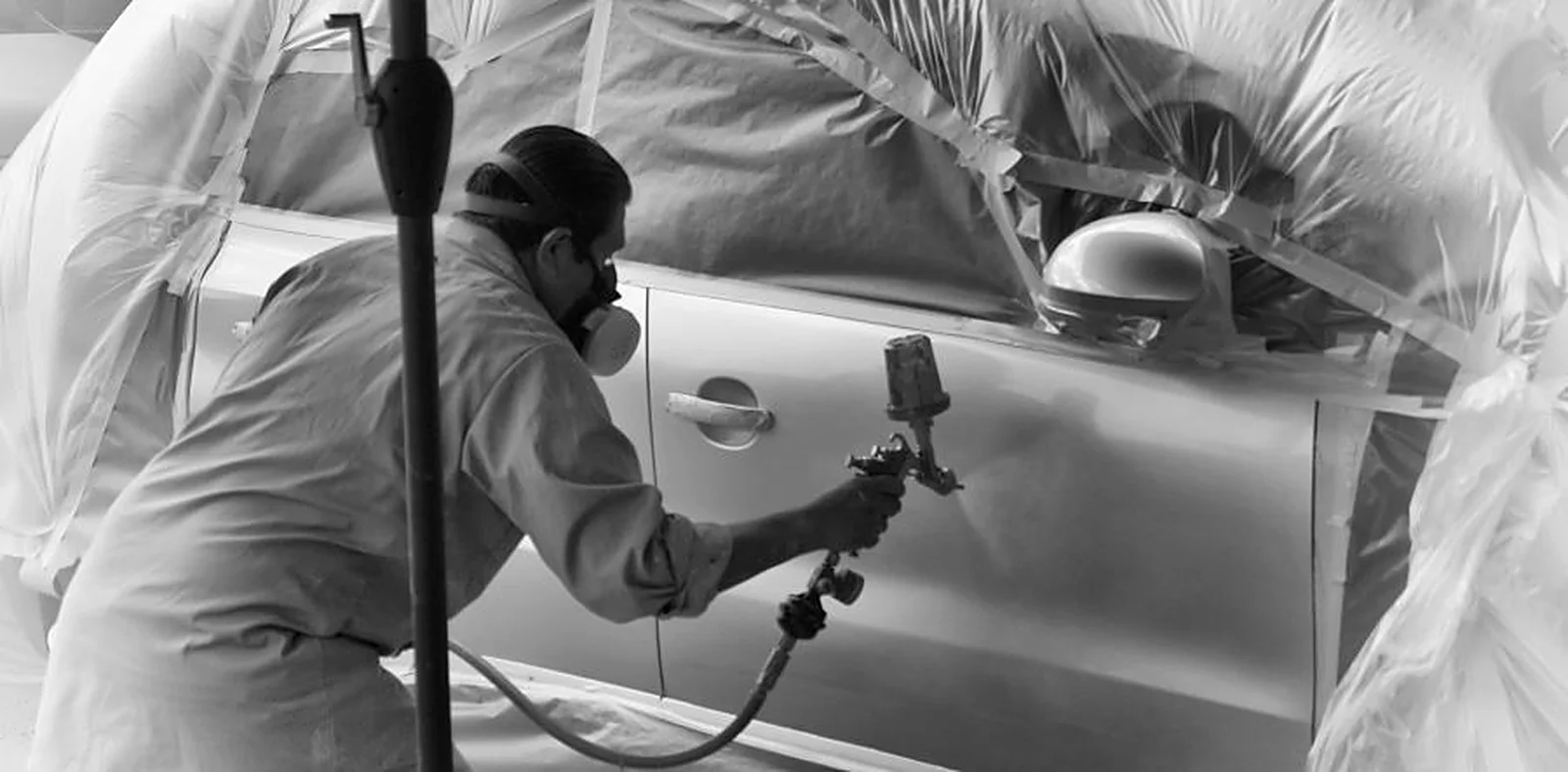 Bumper Time technician repairing a bumper on-site at a customer driveway in San Diego